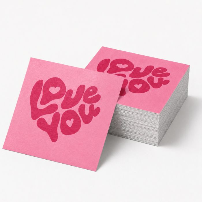 Pegatinas de papel cuadradas personalizadas en color rosa sobre fondo blanco