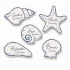 Marcasitios personalizados para boda de la colección Mar con formas marinas troqueladas y nombres de invitados